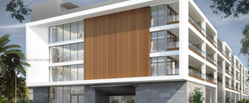 Hollywood apartment for rent - A modern building with a white facade and a large wooden panel on the side.