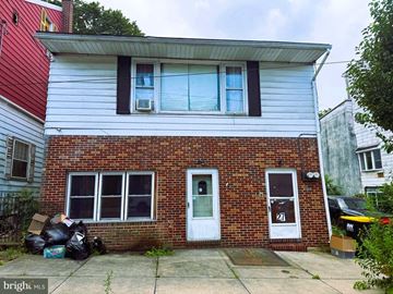 Girardville apartment for rent - A house with a red roof and a white door.