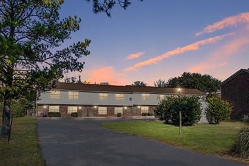 North Charleston apartment for rent - A building with a driveway in front of it.