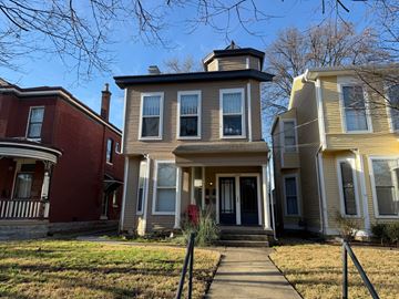 Louisville apartment for rent - A row of houses with a red one on the left.
