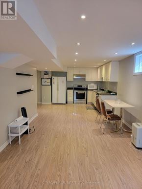 Brampton (Fletcher's Creek South) apartment for rent - A real estate listing image of a kitchen and dining area.