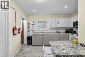Windsor apartment for rent - A kitchen with a granite countertop and cabinets numbered 1 to 5.
