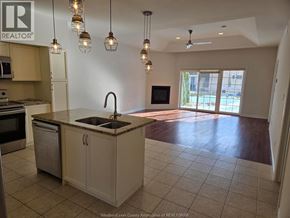 Windsor townhouse for rent - A kitchen with a sink and a microwave.