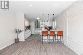London South (South E) apartment for rent - A dining area with a table and chairs is shown in the image.