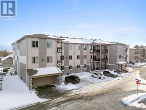 Russell multi-family for rent - A Sleepwell Realty Group brokerage office is shown in a snowy setting.