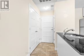 Russell multi-family for rent - A bathroom with a sink and a door.