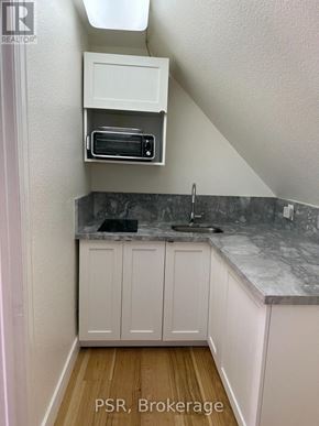 Toronto (Forest Hill South) fourplex for rent - A bathroom with a toilet, a bathtub and a shower.