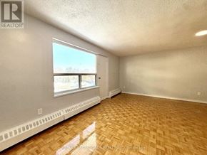 Toronto (Bendale) condo for rent - A room with a window and a radiator on the wall.