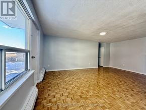 Toronto (Bendale) condo for rent - A room with a window and a radiator on the wall.
