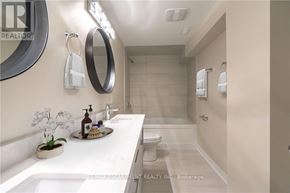 Hamilton (Huntington) apartment for rent - A bathroom with a white sink and a toilet.