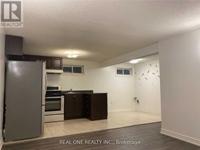Markham (Royal Orchard) apartment for rent - A kitchen with a refrigerator, oven, and microwave.