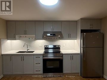 Toronto (Bayview Village) apartment for rent - A kitchen with white cabinets and a stainless steel refrigerator.
