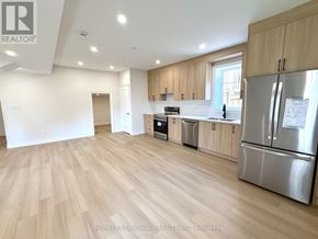 Newmarket (Glenway Estates) apartment for rent - A kitchen with wooden floors and stainless steel appliances.
