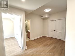 Newmarket (Glenway Estates) apartment for rent - A room with a white door and a white wall.