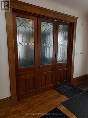 Carleton Place apartment for rent - A pair of wooden doors with glass panels in the middle.