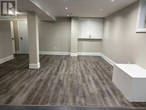 Whitby (Downtown Whitby) apartment for rent - A room with a grey carpet and white walls.