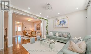 Brampton (Fletcher's West) apartment for rent - A living room with a couch, chairs, and a coffee table.