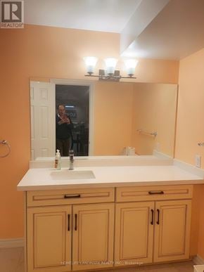 Markham (Victoria Square) apartment for rent - A bathroom with a sink, mirror, and cabinets.