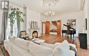 Toronto (Cabbagetown-South St. James Town) apartment for rent - A living room with a grand piano and a fireplace.