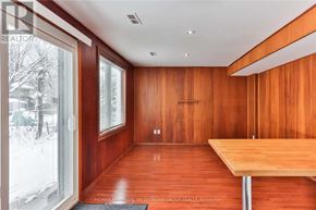 Toronto (Newtonbrook West) apartment for rent - A room with wooden walls and a table.