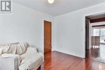 Toronto (Newtonbrook West) apartment for rent - A living room with a couch and a door.