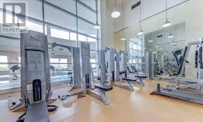 Toronto (Woburn) condo for rent - A gym with treadmills and other exercise equipment.