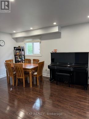 Toronto (Milliken) apartment for rent - A room with a piano and a dining table.