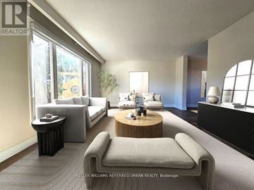 Pickering (West Shore) apartment for rent - A modern living room with a grey sofa and a wooden coffee table.