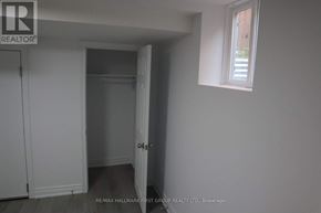 Pickering (Brock Ridge) apartment for rent - A white room with a door and a window.