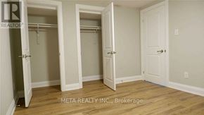 Toronto (Morningside) apartment for rent - A room with a white door and a white cabinet with a white wall and a white floor.