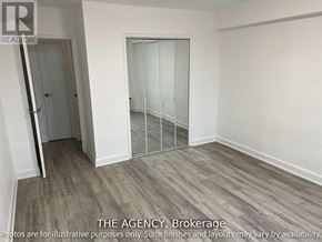 Toronto (Westminster-Branson) condo for rent - A room with a door and a glass partition wall.