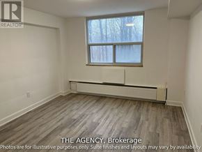 Toronto (Westminster-Branson) condo for rent - A room with a window and a radiator on the floor.