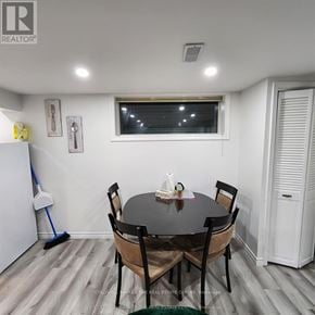 Barrie (Grove East) apartment for rent - A dining room with a table and chairs.