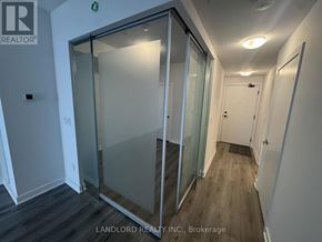 Mississauga (Creditview) condo for rent - A glass door in a white room with a sign that says "REALTOR".