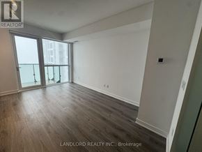 Mississauga (Creditview) condo for rent - A room with wooden flooring and a large window.