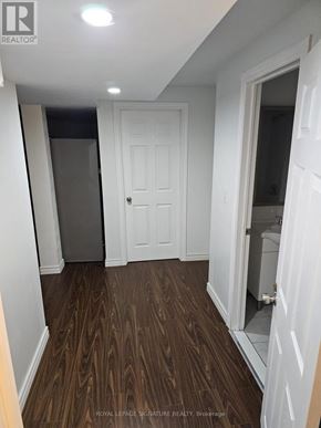 Ajax (Northwest Ajax) apartment for rent - A hallway with a white door and a white wall.