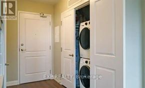 Niagara Falls (Arad/Fallsview) multi-family for rent - A laundry room with a washer and dryer in it.