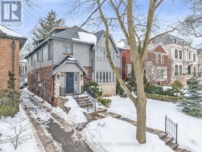 Toronto (Forest Hill South) apartment for rent - A snow-covered street with houses on either side.