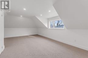 Toronto (Forest Hill South) apartment for rent - A room with a window and a carpeted floor.
