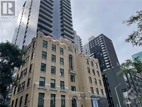 Ottawa apartment for rent - A building with the text "Avenue North Realty Inc., Brokerage" on it.