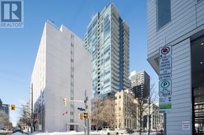 Ottawa apartment for rent - A street view with a no parking sign on the right.