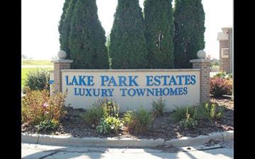 Depere apartment for rent - A sign that says Lake Park Estates Luxury Townhomes.