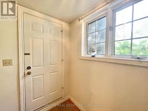 Niagara-On-The-Lake (Town) apartment for rent - A white door with a window next to it.