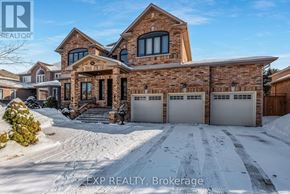 Newmarket (Stonehaven-Wyndham) apartment for rent - A house with a brick facade and a snow-covered driveway.