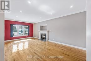 Newmarket (Stonehaven-Wyndham) apartment for rent - A room with a fireplace and a window.