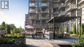 Toronto (Centennial Scarborough) condo for rent - A modern outdoor seating area is surrounded by apartment buildings.