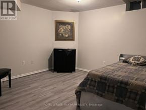 Brampton (Bram East) apartment for rent - A kitchen with a sink, stove, and cabinets.