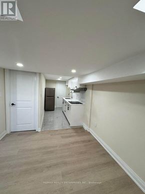 St. Catharines (Carlton/Bunting) apartment for rent - A white door is on the left side of the image.