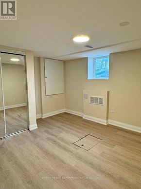 St. Catharines (Carlton/Bunting) apartment for rent - A room with a sliding glass door and a window.