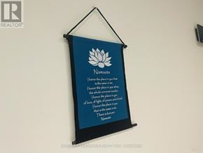 Niagara Falls (Chippawa) apartment for rent - A poster with a lotus flower and the word Namaste on it.